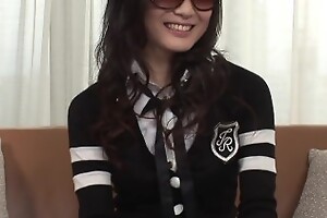 Japanese Akari Yukino with sunglasses suck cock in a threesome uncensored.