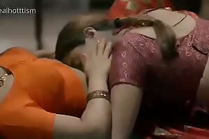 Hawt battalion in saree giving a kiss