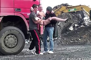 Young blonde cute girl public sex threesome at a construction site