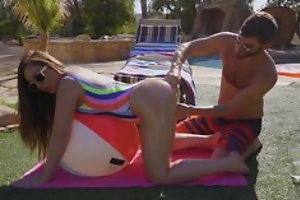 Delicious brunette fucks bearded baffle by the pool