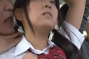 young jap schoolgirl is seduced by elderly man in bus